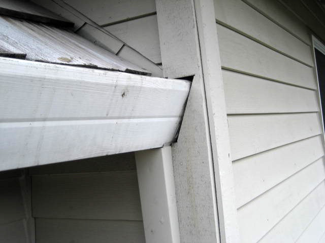 Poor gutter installation - AMI sample photo from a home inspection