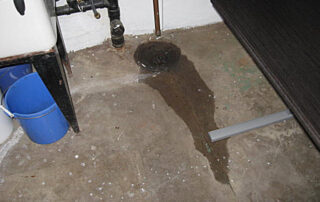 Basement floor drains are supposed to *remove* basement water, not bring it in. - sample photo from a home inspection