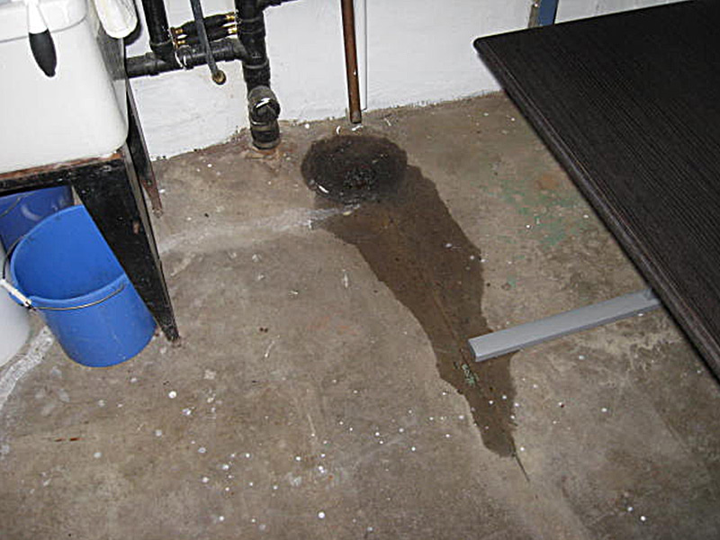 Basement floor drains are supposed to remove basement water not bring it in sample photo from a home inspection