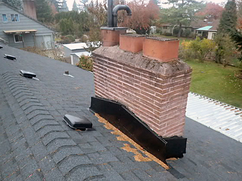 AMI - home inspection sample - Chimney needs a cricket